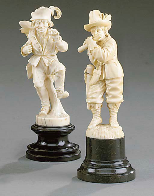 Two carved-ivory figures of peasants