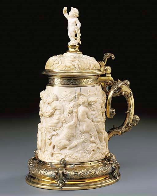 A German gilt-metal and ivory tankard