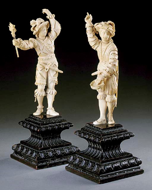 A pair of carved-ivory musketeers