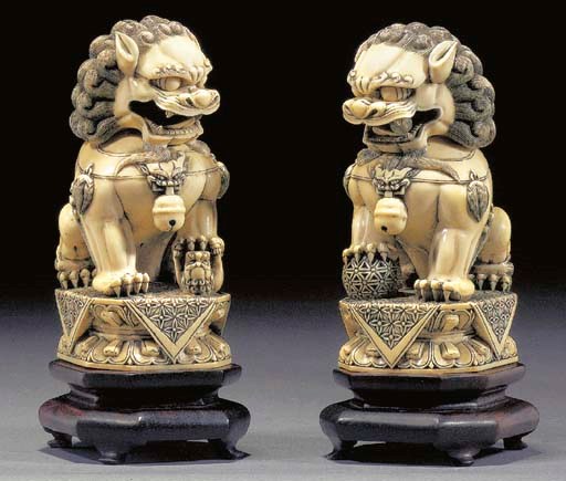 A PAIR OF CHINESE IVORY BUDDHISTIC LIONS
19TH CENTURY