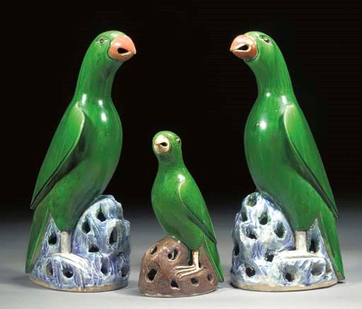 A PAIR OF CHINESE GREEN GLAZED MODELS OF PARROTS
19TH CENTURY