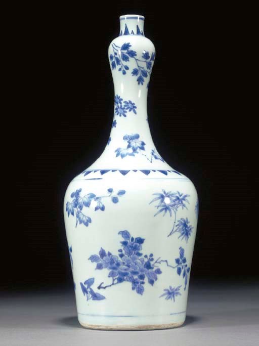 A CHINESE BLUE AND WHITE BOTTLE VASE
TRANSITIONAL
