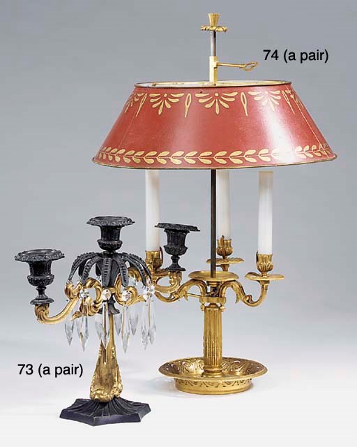 A pair of William IV gilt and patinated bronze three light candelabra, circa 1835