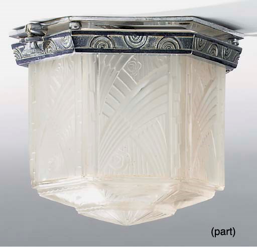 A pair of French Art Deco moulded glass and metal ceiling lights, circa 1925