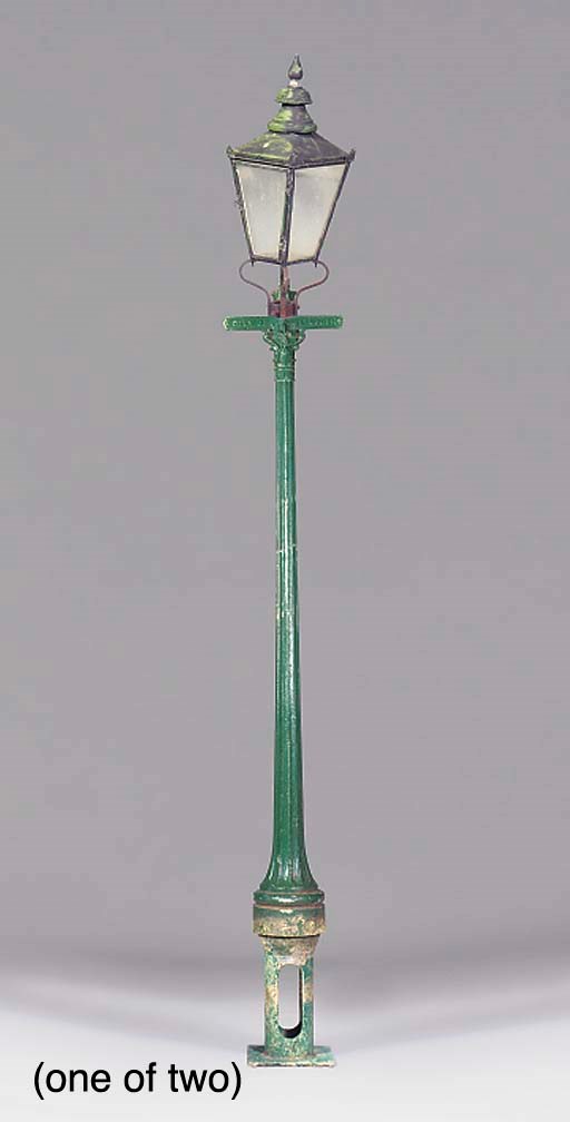 A pair of Victorian painted cast iron lamp posts, late 19th century