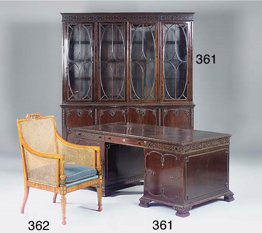 An Edwardian satinwood, simulated and decorated bergere, stamped Maple & Co.