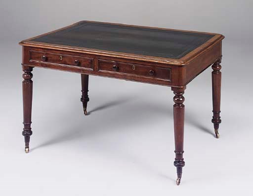 A Victorian mahogany library table