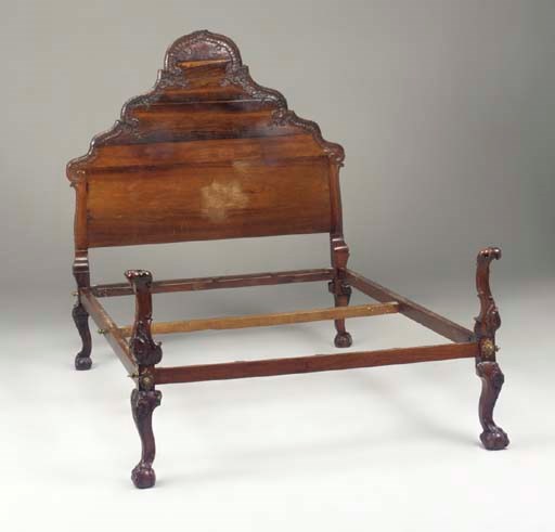 An Anglo Indian carved rosewood bed, possibly Indo-Portuguese