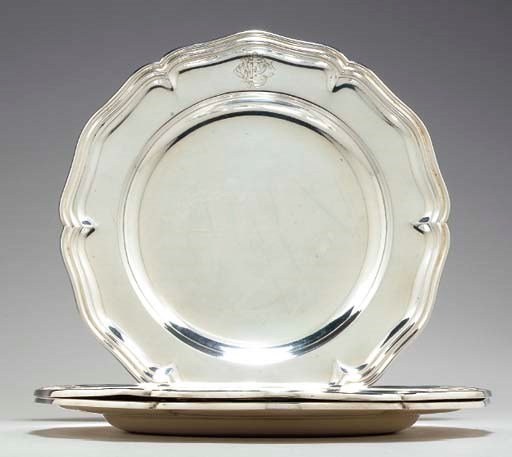 A SET OF TWELVE GERMAN SILVER SERVICE PLATES,