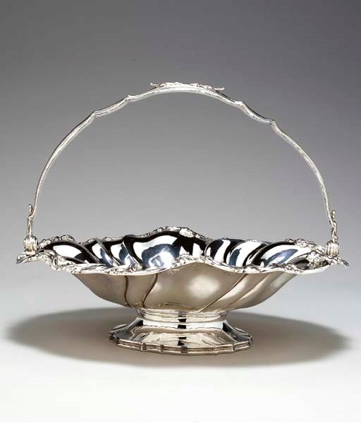 A WILLIAM IV SILVER CAKE BASKET,