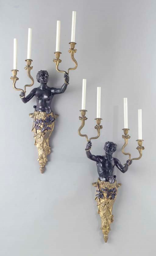 A pair of Louis XVI style ormolu and patinated bronze figural wall lights