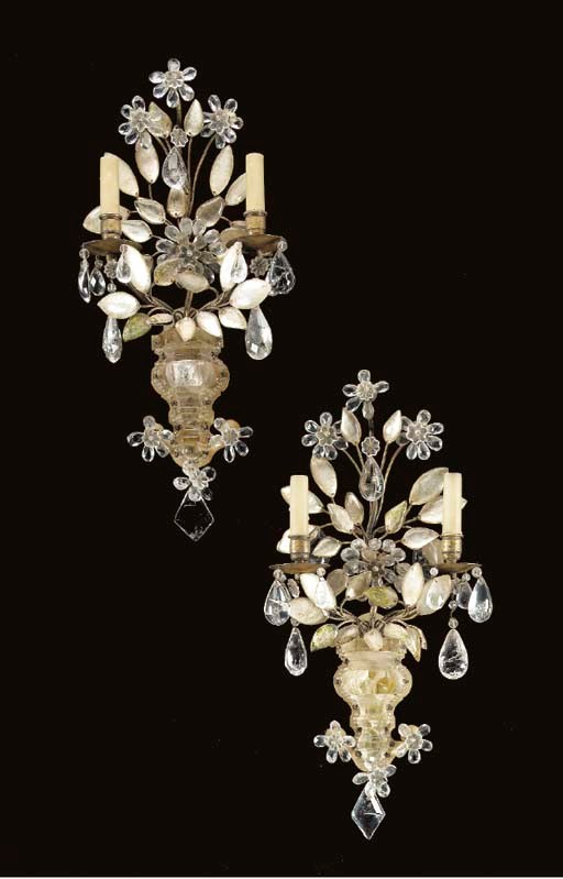 A PAIR OF ROCK CRYSTAL, MOLDED AND CUT-GLASS TWO-LIGHT WALL LIGHTS,