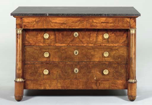 A LATE EMPIRE BRASS-MOUNTED WALNUT COMMODE,