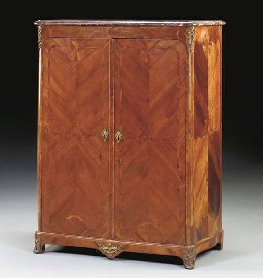 A LOUIS XV ORMOLU-MOUNTED BOIS SATINE AND AMARANTH ARMOIRE,