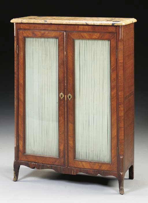 A LOUIS XV/XVI ORMOLU-MOUNTED MAHOGANY, TULIPWOOD AND AMARANTH ARMOIRE,