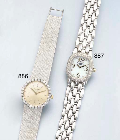 PATEK PHILIPPE. A LADY'S 18K WHITE GOLD AND DIAMOND-SET WRISTWATCH WITH BRACELET