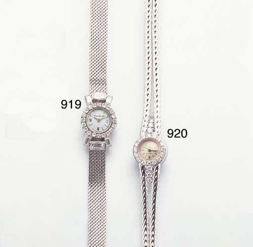 OMEGA. A LADY'S 18K WHITE GOLD AND DIAMOND-SET WRISTWATCH WITH BRACELET