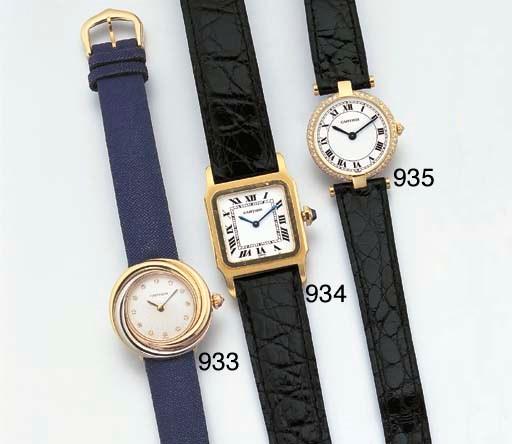 CARTIER. A LADY'S 18K GOLD AND DIAMOND-SET WRISTWATCH