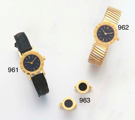 BULGARI. A LADY'S 18K THREE-COLOURED GOLD BANGLE-WATCH