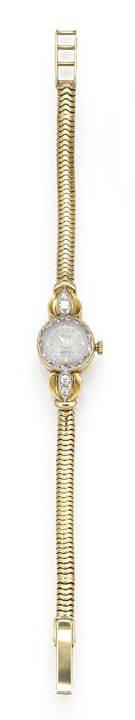 A lady's gold and diamond Rolex bracelet watch