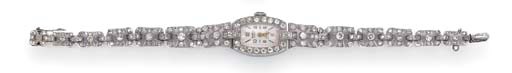 A lady's 1930's diamond and platinum bracelet watch,