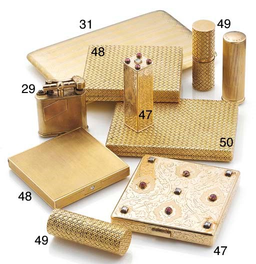 A Dunhill 9ct. gold pocket cigarette lighter,
