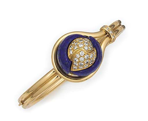 A SPANISH DIAMOND AND LAPIS LAZULI BANGLE,