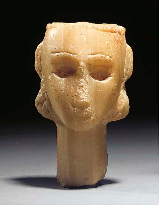 A SOUTH ARABIAN ALABASTER FEMALE HEAD
