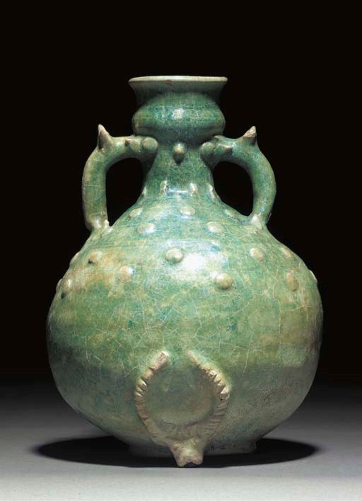 A PARTHIAN GREEN GLAZED POTTERY JAR
