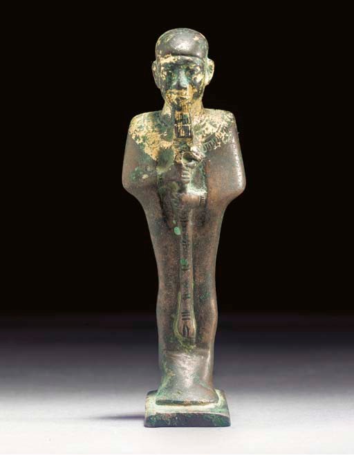 AN EGYPTIAN BRONZE FIGURE OF PTAH