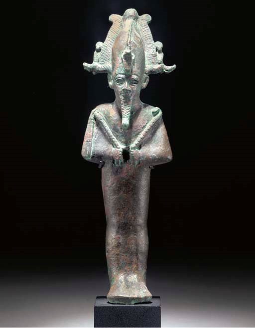 AN EGYPTIAN BRONZE FIGURE OF OSIRIS