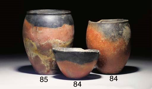 AN EGYPTIAN PREDYNASTIC BLACK-TOPPED RED WARE JAR