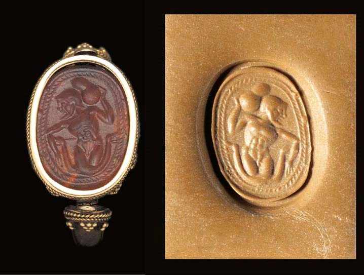 A FINE ETRUSCAN CORNELIAN SCARABOID