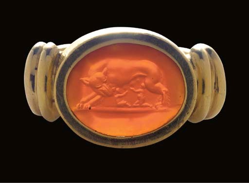 A ROMAN CORNELIAN INTAGLIO WITH ROMULUS AND REMUS