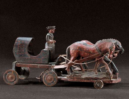 A rare Russian carved and painted wood pull-along toy summer troika