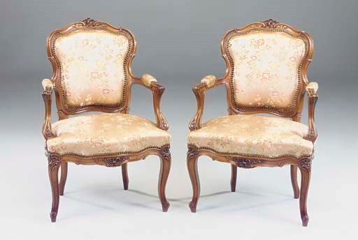 A PAIR OF WALNUT FAUTEUILS