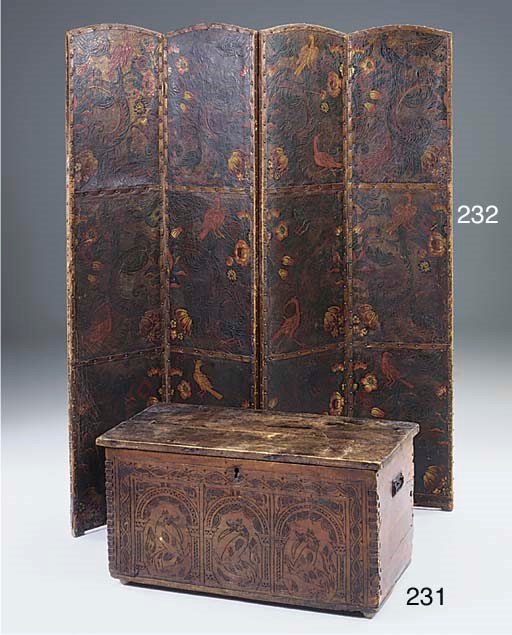 AN ITALIAN RUSTIC CARVED WALNUT COFFER