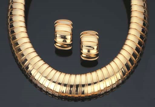 Demi parure in oro giallo, firmata Weingrill