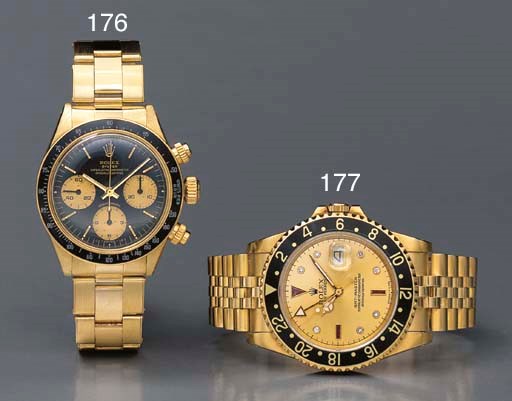 Rolex. A fine 18K gold, ruby and diamond-set self-winding water-resistant dual time zone wristwatch with sweep center seconds, date and bracelet