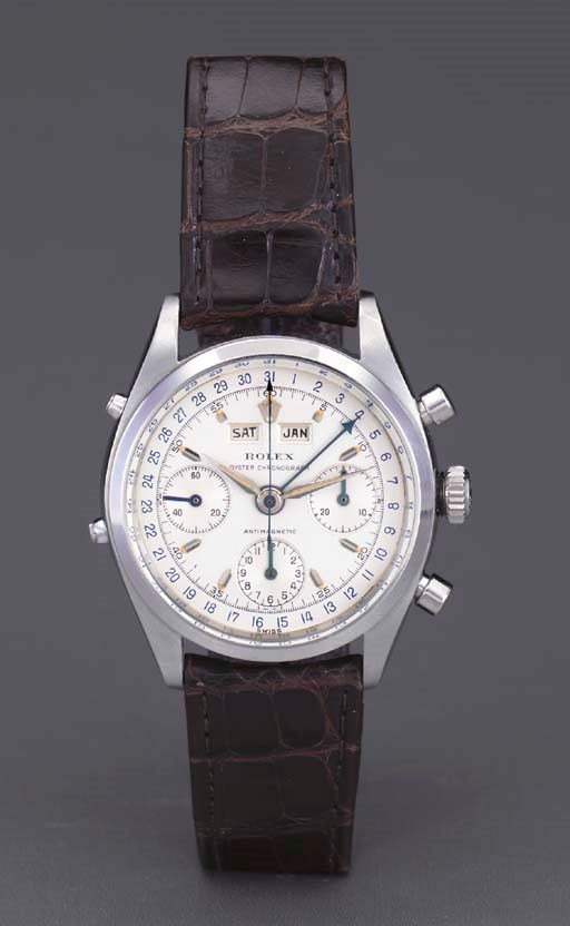 Rolex. A fine and rare stainless steel water-resistant triple calendar chronograph wristwatch