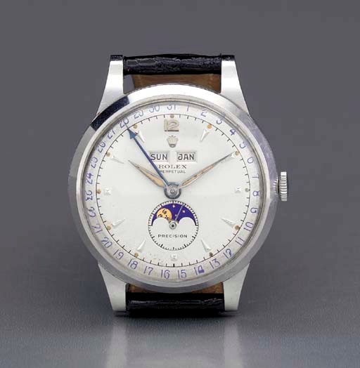 Rolex. A rare stainless steel self-winding triple calendar wristwatch with phases of the moon