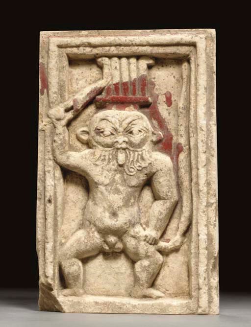 AN EGYPTIAN LIMESTONE RELIEF