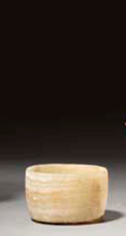 A BACTRIAN CALCITE-ALABASTER BOWL