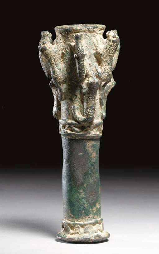 AN ELAMITE COPPER MACEHEAD