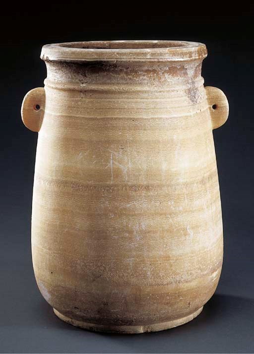 A PHOENICIAN CALCITE-ALABASTER VASE