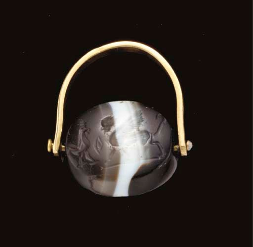 A GRAECO-PERSIAN BANDED AGATE SCARABOID