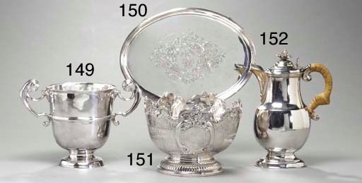 A SILVER TWO-HANDLE CUP,