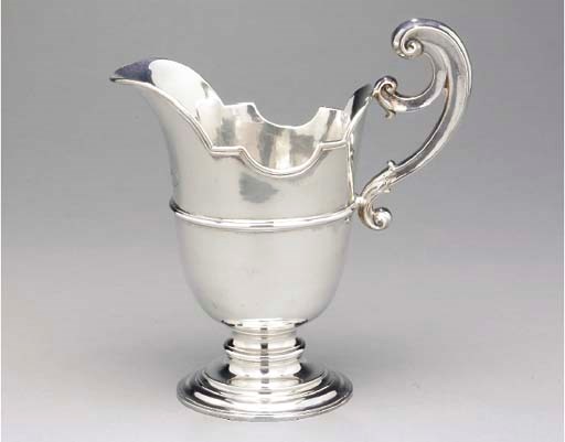 A GEORGE III SILVER EWER,