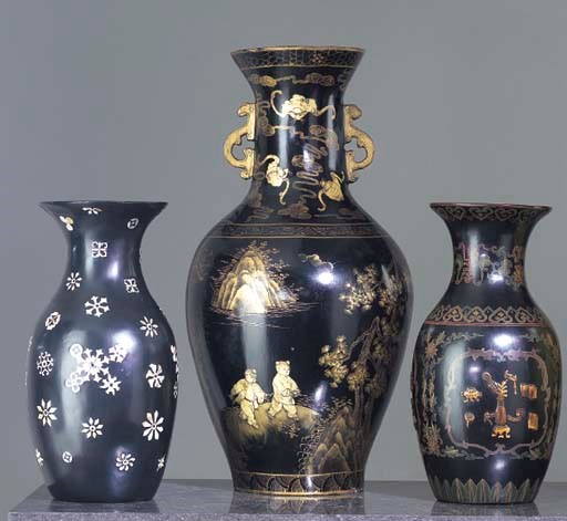 A SET OF THREE JAPANESE MOTHER-OF-PEARL INLAID, BLACK PAINTED AND PARCEL-GILT PAPIER MACHE VASES,