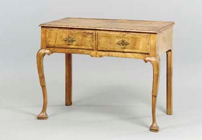 A GEORGE II STYLE WALNUT LOWBOY,